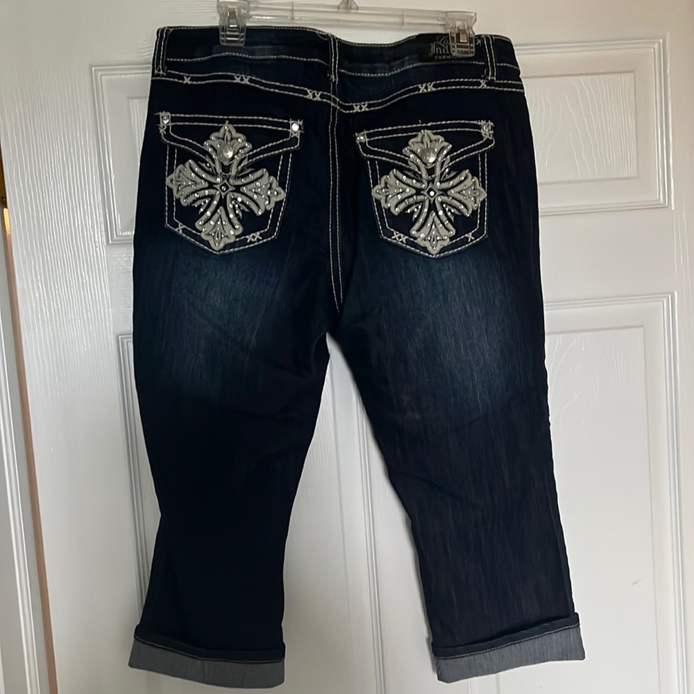 Dark wash capri length with embellishment